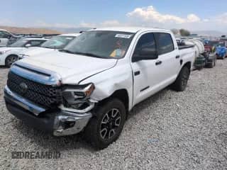 2018 Toyota Tundra SR5 с VIN 5TFDY5F19JX718064, выставлен на аукционе Copart как лот 68221585 с пробегом 84 454 миль миль и Списание • Salvage title. История ставок и продаж доступна на DreamBid. Изображение 1.