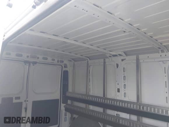 2023 Ram ProMaster Cargo z VIN 3C6LRVVG2PE596243, wystawiony jako IAAI lot #42069331 z przebiegiem 9 332 mil mil oraz . Historia ofert i sprzedaży dostępna na DreamBid. Obrazek 8.