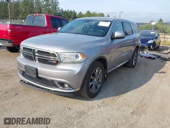 2018 Dodge Durango SXT with VIN 1C4RDJAG3JC115821, listed as a IAAI auction lot 43073569 with 76,495 mi miles and . Bid and sale history available at DreamBid. Image 2.