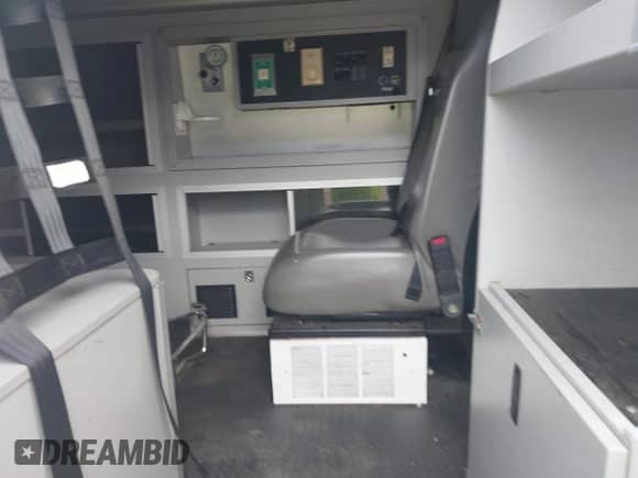 2012 Ford Econoline Cargo Commercial with VIN 1FDSS3EL1CDB10281, listed as a IAAI auction lot 41410176 with 590,744 mi miles and . Bid and sale history available at DreamBid. Image 8.