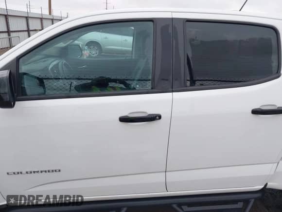 2021 Chevrolet Colorado 4WD Z71 z VIN 1GCGTDEN9M1256767, wystawiony jako IAAI lot #42188311 z przebiegiem 55 116 mil mil oraz . Historia ofert i sprzedaży dostępna na DreamBid. Obrazek 14.