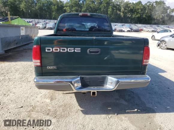 2001 Dodge Dakota Sport with VIN 1B7GL2AN91S107078, listed as a Copart auction lot 66696915 with 214,984 mi miles and Salvage title. Bid and sale history available at DreamBid. Image 6.
