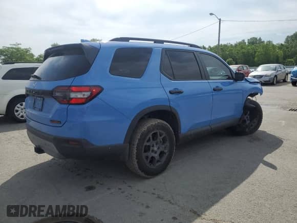 2024 Honda Pilot TrailSport с VIN 5FNYG1H66RB022905, выставлен на аукционе Copart как лот 58893075 с пробегом 38 835 миль миль и Списание • Salvage title. История ставок и продаж доступна на DreamBid. Изображение 3.