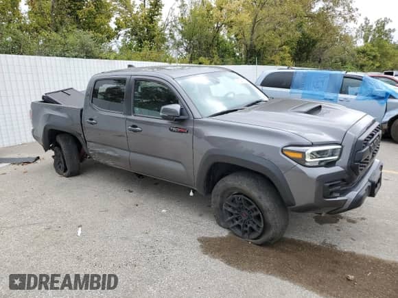 2020 Toyota Tacoma SR5 with VIN 5TFCZ5AN6LX221818, listed as a Copart auction lot 81645745 with 19,809 mi miles and Salvage title. Bid and sale history available at DreamBid. Image 4.