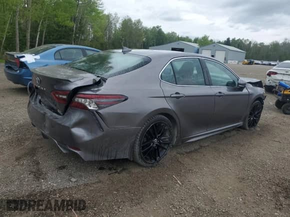 2023 Toyota Camry Hybrid XSE с VIN 4T1K31AK6PU048011, выставлен на аукционе Copart как лот 53983115 с пробегом 195 772 миль миль и Списание • Salvage title. История ставок и продаж доступна на DreamBid. Изображение 3.