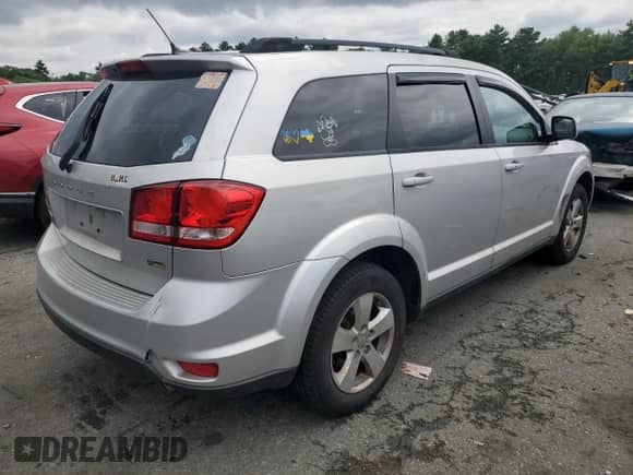2012 Dodge Journey SXT z VIN 3C4PDCBG5CT190741, wystawiony jako Copart lot #67108195 z przebiegiem 198 955 mil mil oraz Szkoda całkowita • Salvage title. Historia ofert i sprzedaży dostępna na DreamBid. Obrazek 3.