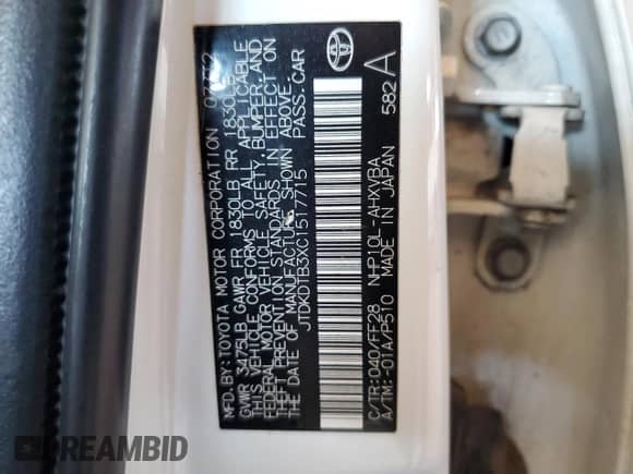 2012 Toyota Prius Four with VIN JTDKDTB3XC1517715, listed as a Copart auction lot 82223565 with 103,562 mi miles and Salvage title. Bid and sale history available at DreamBid. Image 12.