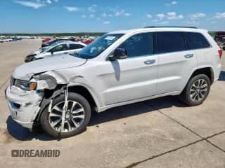 2017 Jeep Grand Cherokee Overland с VIN 1C4RJFCG8HC713061, выставлен на аукционе Copart как лот 65800955 с пробегом 193 619 миль миль и Чистый • Clean title. История ставок и продаж доступна на DreamBid. Изображение 1.