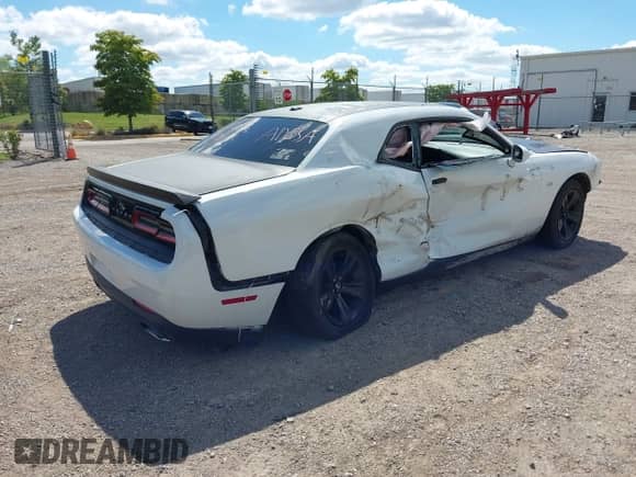 2017 Dodge Challenger SXT Plus with VIN 2C3CDZAG5HH605905, listed as a IAAI auction lot 43048856 with 58,221 mi miles and . Bid and sale history available at DreamBid. Image 4.