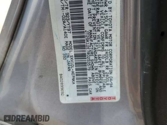 1994 Toyota Camry LE z VIN JT2SK12E7R0253579, wystawiony jako Copart lot #64373175 z przebiegiem 256 168 mil mil oraz Szkoda całkowita • Salvage title. Historia ofert i sprzedaży dostępna na DreamBid. Obrazek 12.