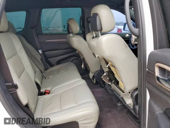 2016 Jeep Grand Cherokee Laredo with VIN 1C4RJEAGXGC415722, listed as a Copart auction lot 65428555 with 211,133 mi miles and Salvage title. Bid and sale history available at DreamBid. Image 10.