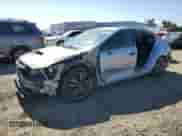 2016 Subaru WRX Premium with VIN JF1VA1E6XG9803173, listed as a Copart auction lot 64681725 with 186,608 mi miles and Salvage title. Bid and sale history available at DreamBid. Image 1.