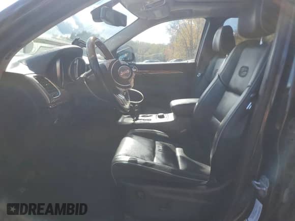 2011 Jeep Grand Cherokee Overland with VIN 1J4RR6GT2BC586843, listed as a Copart auction lot 82640575 with 105,457 mi miles and Salvage title. Bid and sale history available at DreamBid. Image 7.