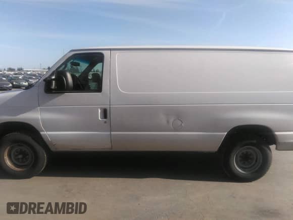 2013 Ford Econoline Cargo Commercial with VIN 1FTSE3EL3DDA30378, listed as a IAAI auction lot 42064788 with 285,473 mi miles and . Bid and sale history available at DreamBid. Image 14.