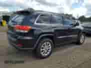 2014 Jeep Grand Cherokee Laredo with VIN 1C4RJEAG4EC207784, listed as a Copart auction lot 81490235 with 165,048 mi miles and Salvage title. Bid and sale history available at DreamBid. Image 3.