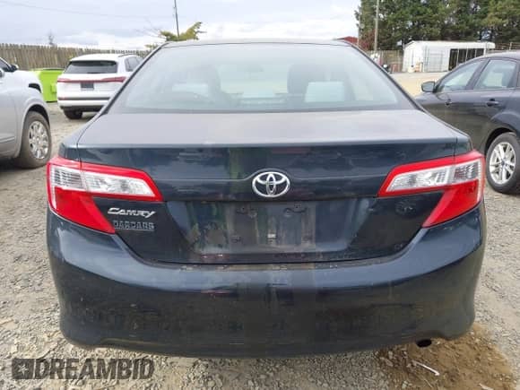 2014 Toyota Camry XLE with VIN 4T4BF1FK3ER375520, listed as a IAAI auction lot 43566867 with 242,702 mi miles and . Bid and sale history available at DreamBid. Image 16.