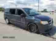 2013 Dodge Grand Caravan SE with VIN 2C4RDGBG8DR808879, listed as a Copart auction lot 71245925 with 182,737 mi miles and Salvage title. Bid and sale history available at DreamBid. Image 4.