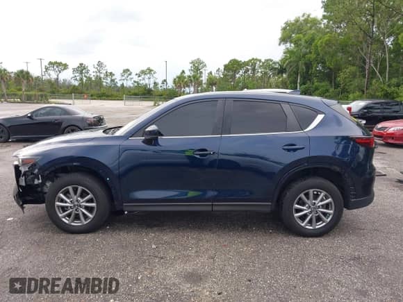 2023 Mazda CX-5 S Preferred z VIN JM3KFBCMXP0209359, wystawiony jako IAAI lot #42724622 z przebiegiem 14 682 mil mil oraz . Historia ofert i sprzedaży dostępna na DreamBid. Obrazek 14.