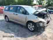 2015 Toyota Sienna L with VIN 5TDZK3DC4FS650415, listed as a IAAI auction lot 42395118 with 486,330 mi miles and . Bid and sale history available at DreamBid. Image 1.