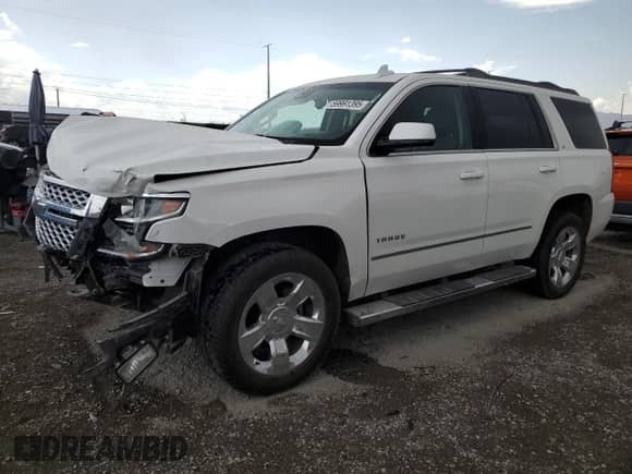 2019 Chevrolet Tahoe LT z VIN 1GNSKBKC0KR267652, wystawiony jako Copart lot #59991395 z przebiegiem 65 479 mil mil oraz Szkoda całkowita • Salvage title. Historia ofert i sprzedaży dostępna na DreamBid. Obrazek 1.
