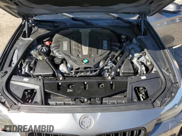 2016 BMW 5 Series 550i z VIN WBAKN9C51GD962751, wystawiony jako Copart lot #84439695 z przebiegiem 162 491 mil mil oraz Szkoda całkowita • Salvage title. Historia ofert i sprzedaży dostępna na DreamBid. Obrazek 11.