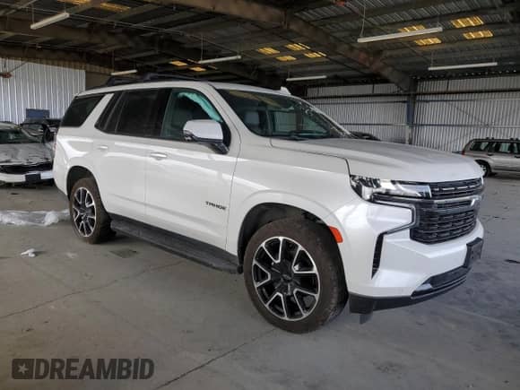 2021 Chevrolet Tahoe RST with VIN 1GNSKRKD3MR326195, listed as a Copart auction lot 80020805 with 97,523 mi miles and Salvage title. Bid and sale history available at DreamBid. Image 4.