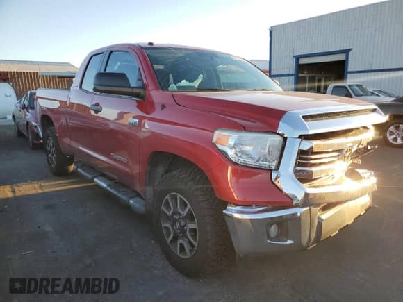 2016 Toyota Tundra SR5 с VIN 5TFUW5F14GX571537, выставлен на аукционе Copart как лот 82139135 с пробегом 103 385 миль миль и Списание • Salvage title. История ставок и продаж доступна на DreamBid. Изображение 4.