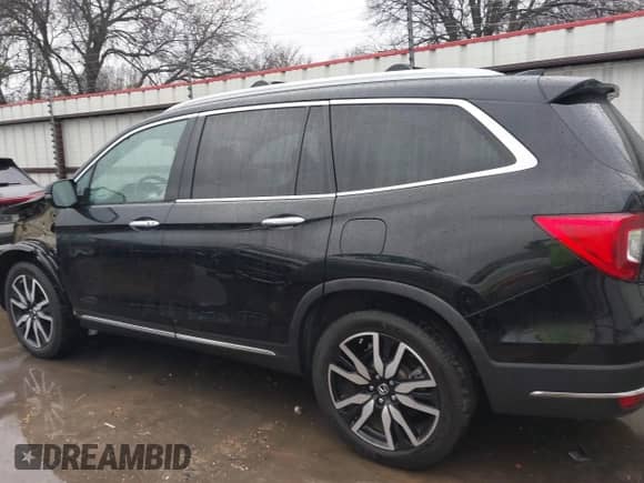 2020 Honda Pilot Touring 7-Passenger z VIN 5FNYF5H64LB000287, wystawiony jako IAAI lot #41288778 z przebiegiem 58 568 mil mil oraz . Historia ofert i sprzedaży dostępna na DreamBid. Obrazek 15.
