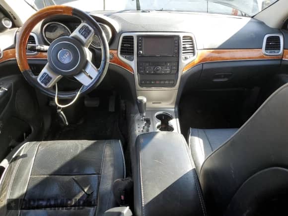 2012 Jeep Grand Cherokee Overland Summit z VIN 1C4RJFCT3CC251157, wystawiony jako Copart lot #84759595 z przebiegiem 213 532 mil mil oraz Szkoda całkowita • Salvage title. Historia ofert i sprzedaży dostępna na DreamBid. Obrazek 8.