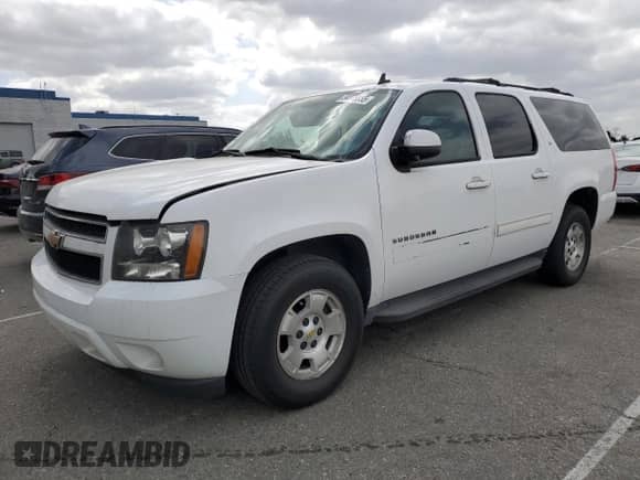 2010 Chevrolet Suburban LT z VIN 1GNUCJE05AR210539, wystawiony jako Copart lot #54875855 z przebiegiem 166 305 mil mil oraz Czysty tytuł • Clean title. Historia ofert i sprzedaży dostępna na DreamBid. Obrazek 1.