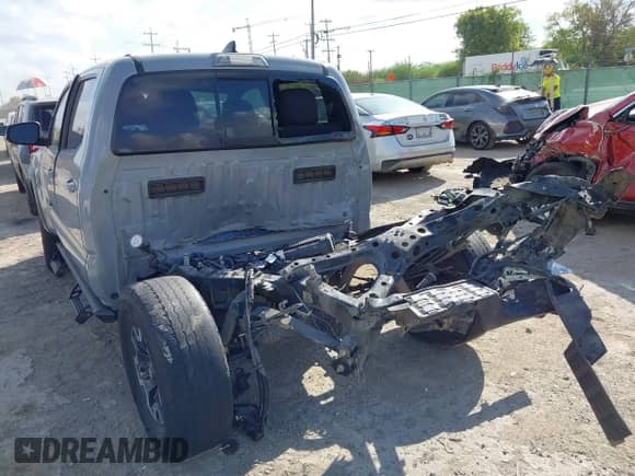 2019 Toyota Tacoma TRD Off Road with VIN 3TMCZ5AN9KM279023, listed as a IAAI auction lot 43200273 with 68,836 mi miles and . Bid and sale history available at DreamBid. Image 6.