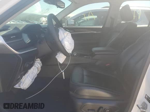 2023 Jeep Grand Cherokee Limited z VIN 1C4RJGBG3PC521049, wystawiony jako Copart lot #49867955 z przebiegiem 46 077 mil mil oraz Szkoda całkowita • Salvage title. Historia ofert i sprzedaży dostępna na DreamBid. Obrazek 7.