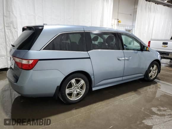 2013 Honda Odyssey Touring с VIN 5FNRL5H90DB044358, выставлен на аукционе Copart как лот 83942565 с пробегом 196 999 миль миль и Списание • Salvage title. История ставок и продаж доступна на DreamBid. Изображение 3.