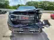 2023 GMC Sierra 1500 Denali with VIN 1GTUUGE88PZ274498, listed as a Copart auction lot 64927885 with 28,326 mi miles and Salvage title. Bid and sale history available at DreamBid. Image 5.