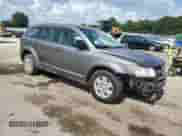 2012 Dodge Journey American Value with VIN 3C4PDCABXCT367581, listed as a Copart auction lot 71170095 with 191,484 mi miles and Salvage title. Bid and sale history available at DreamBid. Image 4.