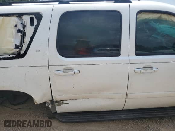 2008 Chevrolet Suburban 3LT z VIN 3GNFC16048G157916, wystawiony jako Copart lot #69308085 z przebiegiem Nie podano mil oraz Szkoda całkowita • Salvage title. Historia ofert i sprzedaży dostępna na DreamBid. Obrazek 11.