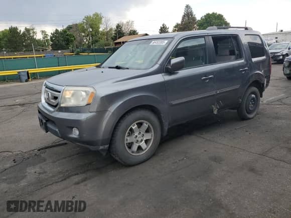 2010 Honda Pilot Touring with VIN 5FNYF4H88AB015853, listed as a Copart auction lot 66453385 with 75,124 mi miles and Clean title. Bid and sale history available at DreamBid. Image 1.
