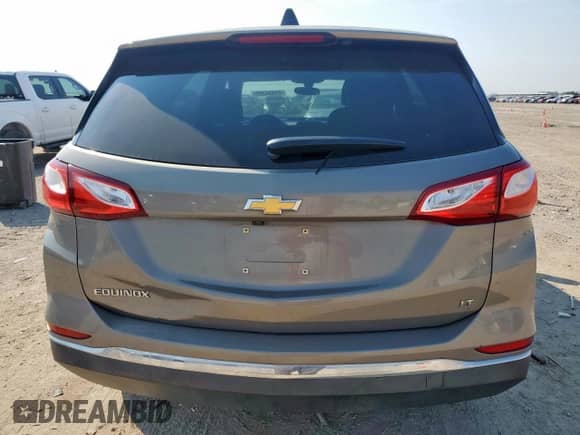 2018 Chevrolet Equinox LT с VIN 3GNAXJEV2JS645468, выставлен на аукционе Copart как лот 69454395 с пробегом 99 114 миль миль и Списание • Salvage title. История ставок и продаж доступна на DreamBid. Изображение 6.