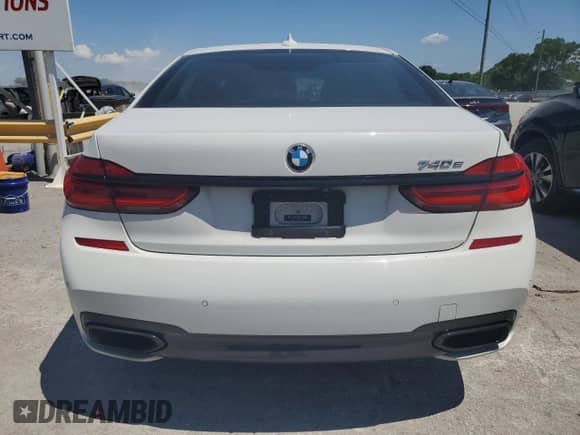 2017 BMW 7 Series 740e xDrive with VIN WBA7J2C34HG497678, listed as a Copart auction lot 55715124 with 40,852 mi miles and . Bid and sale history available at DreamBid. Image 6.
