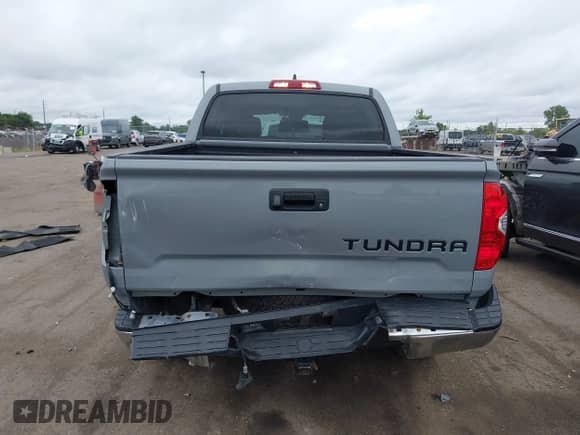 2021 Toyota Tundra SR5 with VIN 5TFDY5F18MX037950, listed as a IAAI auction lot 43029193 with 52,984 mi miles and . Bid and sale history available at DreamBid. Image 16.