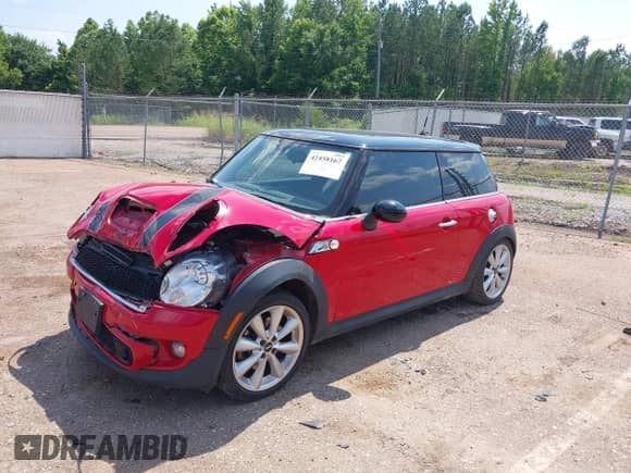 2013 MINI Hardtop S with VIN WMWSV3C57DT478646, listed as a IAAI auction lot 42458167 with 112,784 mi miles and . Bid and sale history available at DreamBid. Image 2.