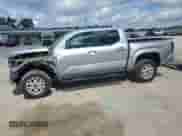 2024 Toyota Tacoma SR5 with VIN 3TMKB5FN1RM023512, listed as a Copart auction lot 68438505 with 5,994 mi miles and Salvage title. Bid and sale history available at DreamBid. Image 1.