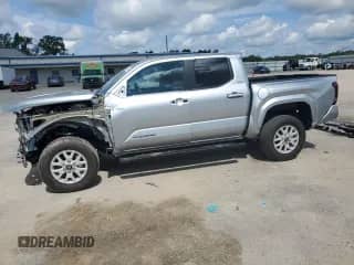2024 Toyota Tacoma SR5 with VIN 3TMKB5FN1RM023512, listed as a Copart auction lot 68438505 with 5,994 mi miles and Salvage title. Bid and sale history available at DreamBid. Image 1.