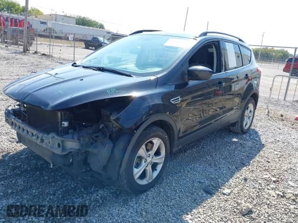 2014 Ford Escape SE with VIN 1FMCU0G91EUA34787, listed as a IAAI auction lot 43215686 with 168,628 mi miles and . Bid and sale history available at DreamBid. Image 2.