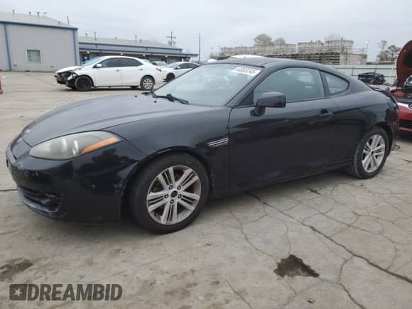 2008 Hyundai Tiburon GS с VIN KMHHM66D28U264874, выставлен на аукционе Copart как лот 44803245 с пробегом 193 975 миль миль и Списание • Salvage title. История ставок и продаж доступна на DreamBid. Изображение 1.