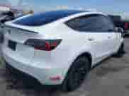 2023 Tesla Model Y Long Range with VIN 7SAYGDEE7PA124885, listed as a IAAI auction lot 43084065 with 22,983 mi miles and . Bid and sale history available at DreamBid. Image 4.