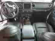 2022 Jeep Wrangler Unlimited Sahara with VIN 1C4JJXP62NW266791, listed as a Copart auction lot 64863535 with 61,452 mi miles and Salvage title. Bid and sale history available at DreamBid. Image 8.