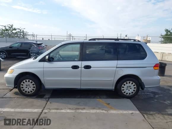 2004 Honda Odyssey LX with VIN 5FNRL18524B042391, listed as a IAAI auction lot 43280655 with 165,252 mi miles and . Bid and sale history available at DreamBid. Image 15.