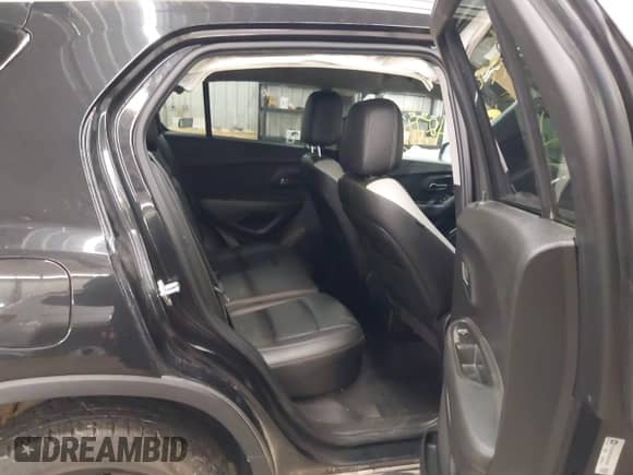 2016 Chevrolet Trax LTZ with VIN KL7CJRSB7GB705659, listed as a IAAI auction lot 42782055 with 52,764 mi miles and . Bid and sale history available at DreamBid. Image 8.