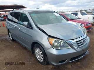2009 Honda Odyssey EX z VIN 5FNRL384X9B027020, wystawiony jako IAAI lot #41574794 z przebiegiem Nie podano mil oraz . Historia ofert i sprzedaży dostępna na DreamBid. Obrazek 1.